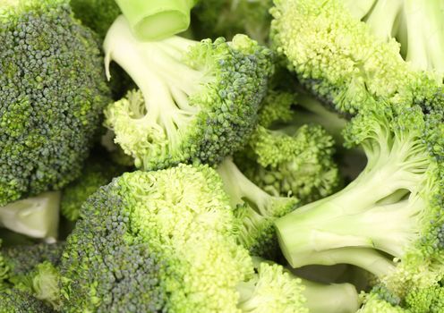 Broccoli in a pile on a farm stand. Close up.