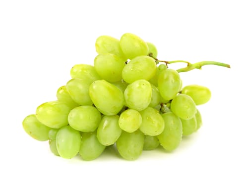 bunch of ripe and juicy green grapes close-up on a white background