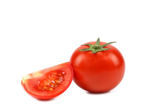 Tomato and segment isolated on a white background.