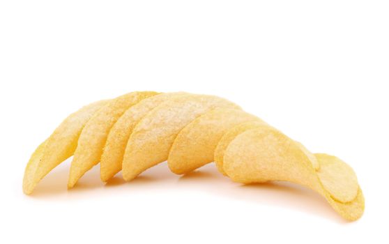 Row of potato chips. Isolated on a white background.
