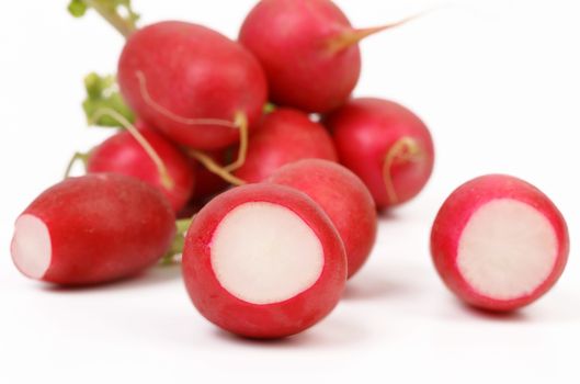 fresh radishes isolated on a white background