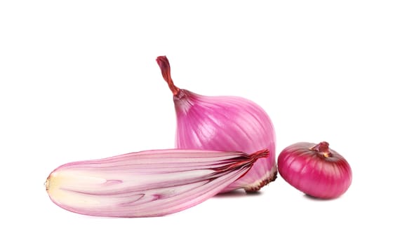 Red onions and slice. Isolated on a white background.