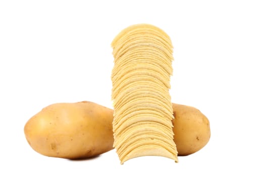 Tubers of potato and stack chips. White background.