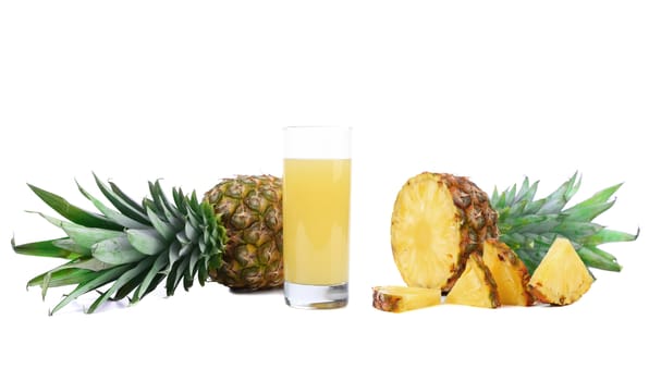 Pineapple juice in a glass and slices. Image on white background.