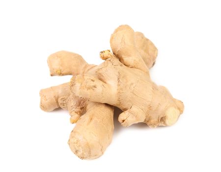 Root ginger isolated on a white studio background.