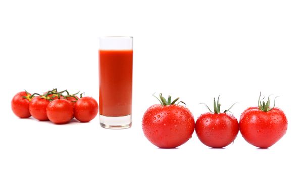 Tomatoes and glass of juice isolated on white