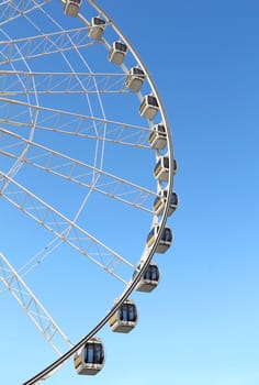 Ferris wheel against a blue sky