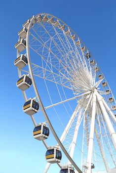 Ferris wheel against a blue sky 