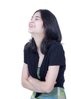 Young biracial teen girl laughing, head back and eyes closed