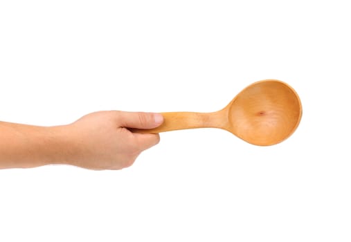 Hand Holds Wooden Spoon Isolated on a white background