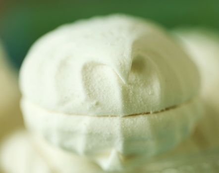 White marshmallow sandwich. Close up. Blurred background.
