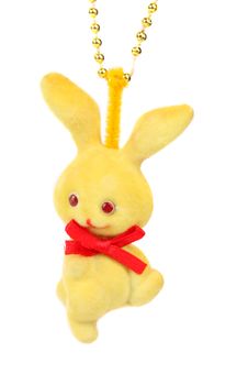 Yellow rabbit. Toy of christmas tree. White background.