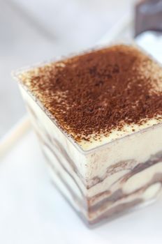 close up of Tiramisu cake in  a  glass , selective focus
