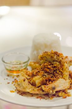 close up fried shrimp with chili and garlic   , served with steamed rice and chili sauce
