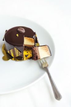 Coffee mousse cake with  dark chocolate with fork 