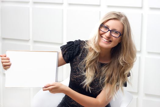 Portrait of the business woman with a represent folder.