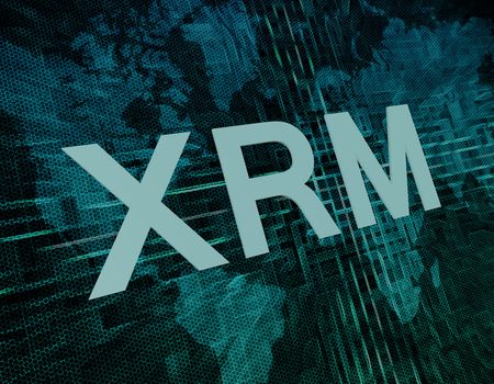 Words on digital world map concept: XRM