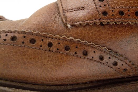 Detail image of a man brown shoe