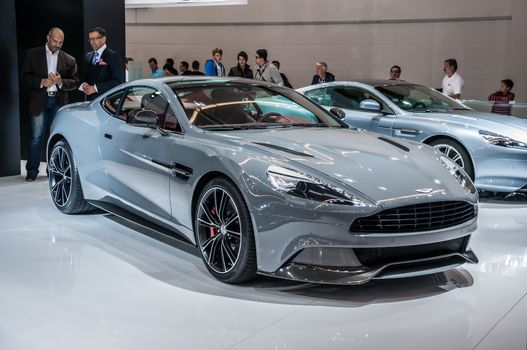 FRANKFURT - SEPT 21: Aston Martin Vanquish Coupe presented as world premiere at the 65th IAA (Internationale Automobil Ausstellung) on September 21, 2013 in Frankfurt, Germany