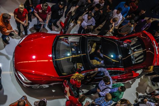 FRANKFURT - SEPT 21: new 2014 Tesla Model S eletric auto presented as world premiere at the 65th IAA (Internationale Automobil Ausstellung) on September 21, 2013 in Frankfurt, Germany