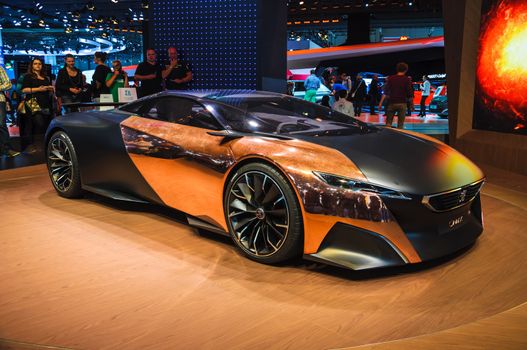 FRANKFURT - SEPT 21: Peugeot Onyx hybrid supercar (conceptcar) presented as world premiere at the 65th IAA (Internationale Automobil Ausstellung) on September 21, 2013 in Frankfurt, Germany