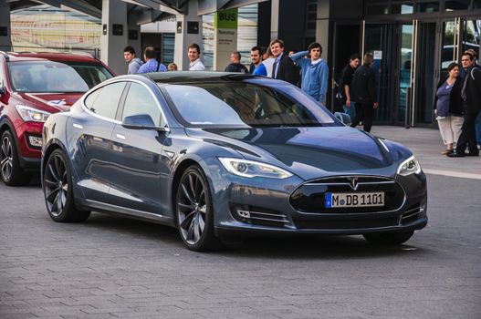 FRANKFURT - SEPT 21: new 2014 Tesla Model S eletric auto presented as world premiere at the 65th IAA (Internationale Automobil Ausstellung) on September 21, 2013 in Frankfurt, Germany