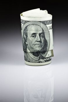 The money hundred dollar bills of American with black and white gradient background