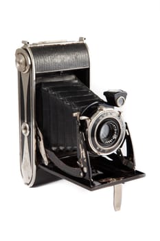 Old vintage camera on white background