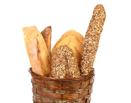 Various types of bread in a basket. Close up.