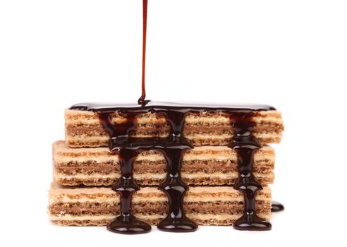 Coated stake wafers of chocolate. White background.