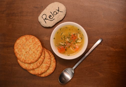 relax with a bowl of vegetable soup and crackers