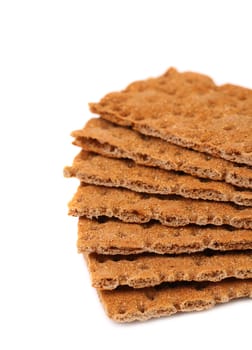 Whole grain crisp bread isolated on a white background.