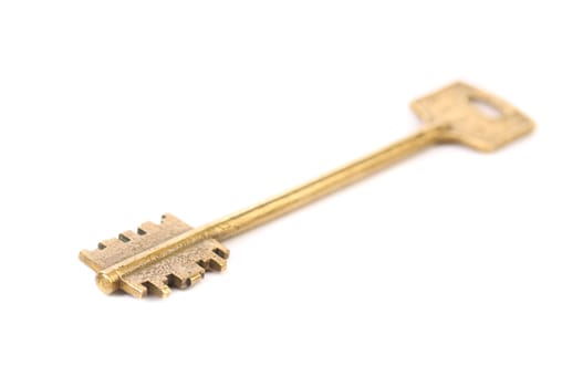 Bronze key. Isolated on a white background.
