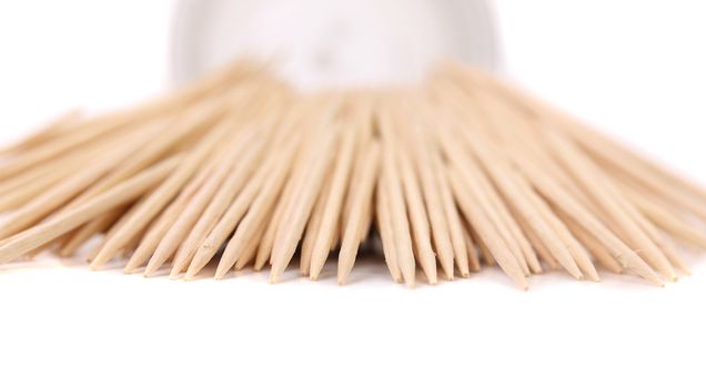 Toothpicks get out round box. White background.