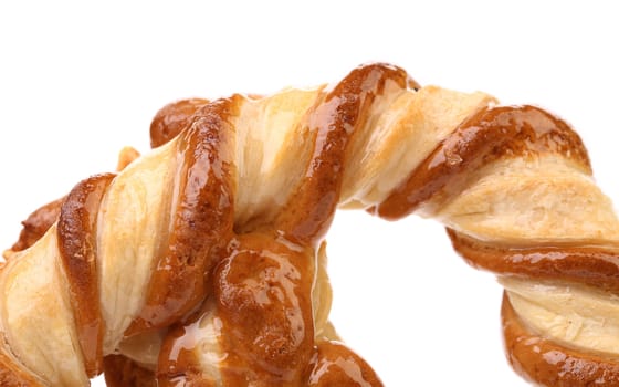 Fragment of knot-shaped biscuits on a white background
