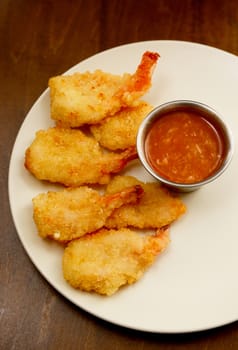 fried shrimp meal with spicy, hot chili sauce