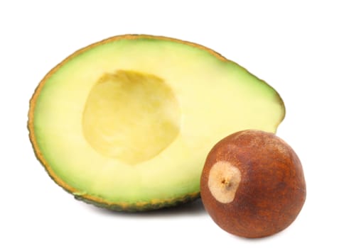 Slice and stone of avocado. White background.