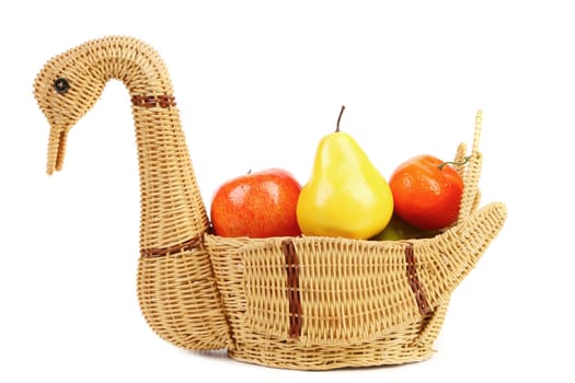 Basket swan with decorative fruits. White background.