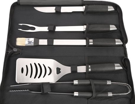 Set of tools for bbq in black bag. Close up.