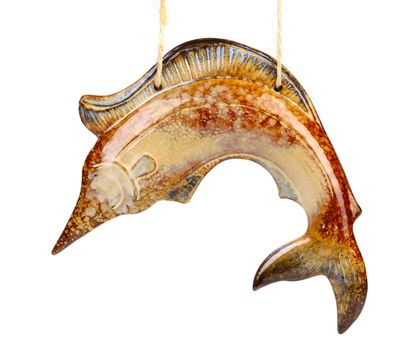 Ceramics fish hands oh string. White background.