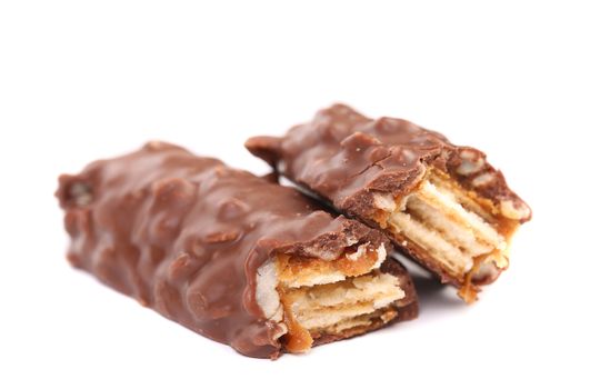 Broken chocolate bar. Close up. White background.