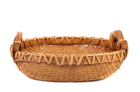 Empty wicker basket isolated on a white background