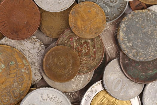 Background of different coins. Close up. Whole background.
