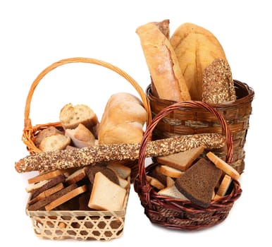Composition of breads and baskets. White baackground.