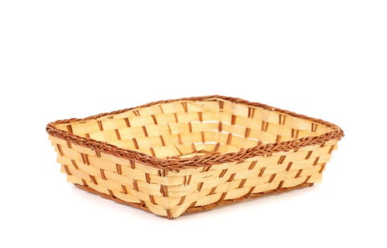 Empty wicker basket isolated on a white background