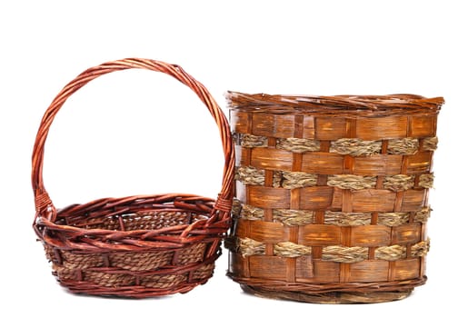 Vintage weave wicker baskets isolated on a white background