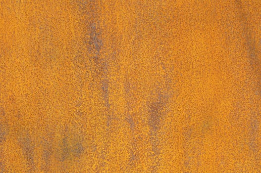 Orange Patterns on the Rusty Surface of the Metal