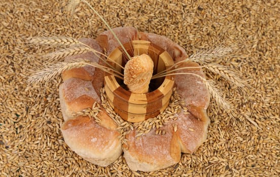 Bread composition on wheat grain. Close up.