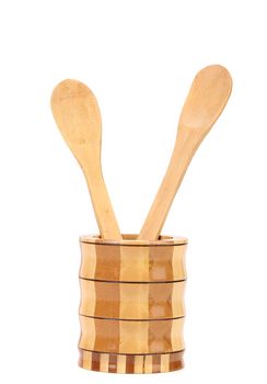 Wooden kitchen utensils in a jar. White background.