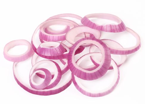 Rings of red onion on a white background